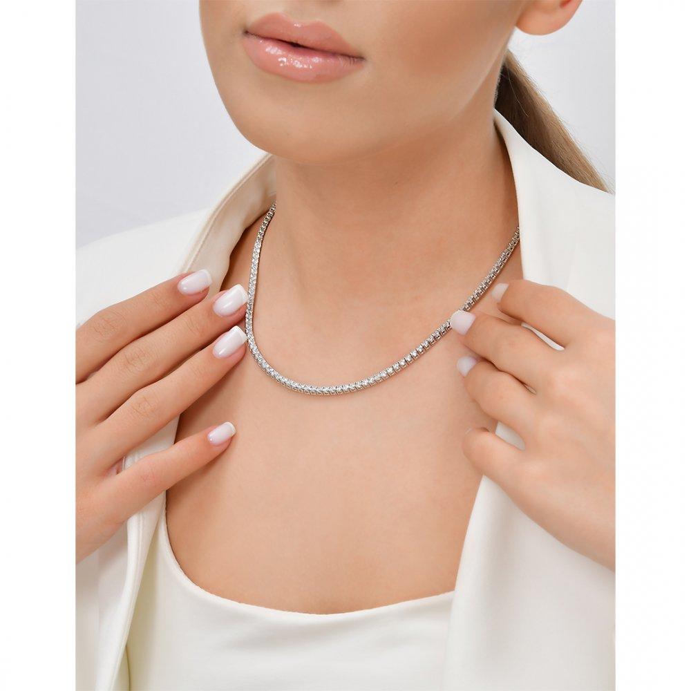 Statement Tennis Necklace Lined In Sparkling Round Diamonds
Diamonds: 6.28.Ct. 71 Round Diamonds
Color: E
Clarity: Vs
14K White Gold 22.20 Gram
16