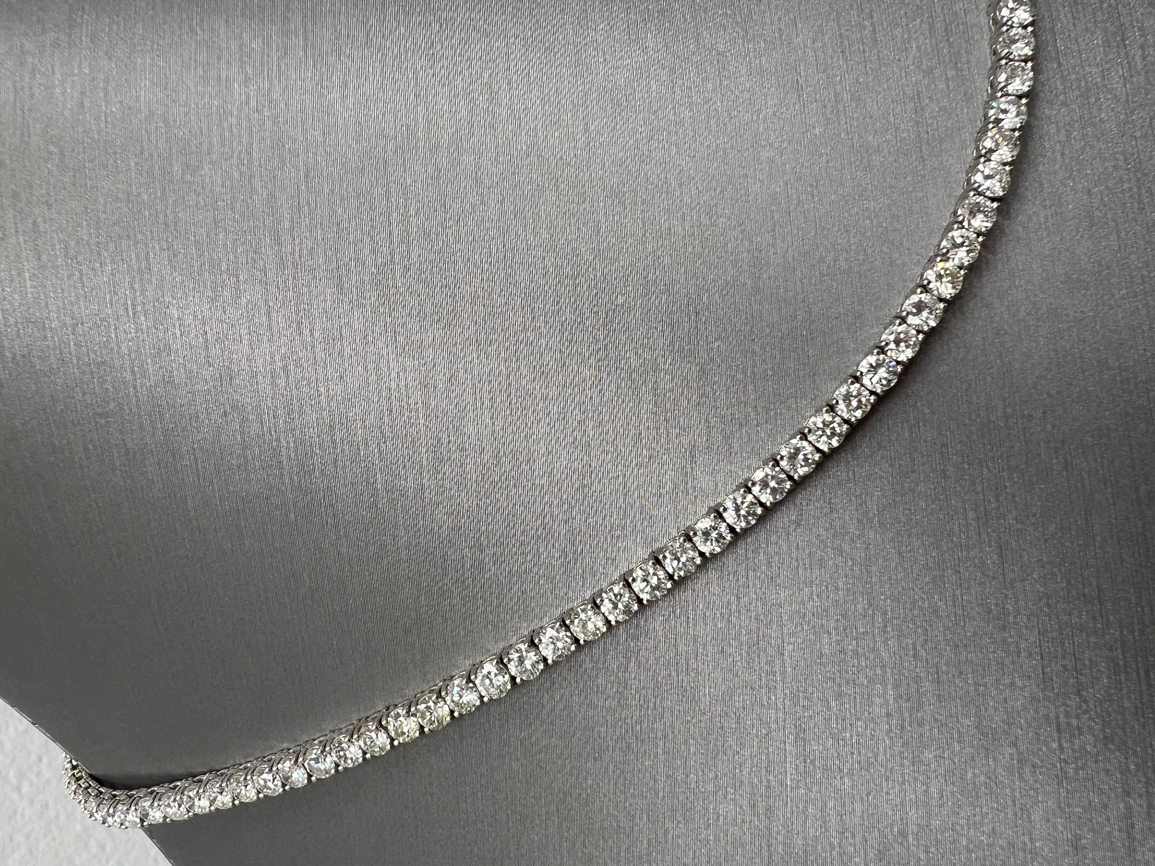 Natural Diamond Tennis Necklace in 14k White Gold, 18.03ctw, 4 prongs, 18' Inch
This exquisite diamond tennis necklace is crafted in lustrous 14k white gold, exuding a sleek and timeless elegance. The necklace features a stunning total weight of