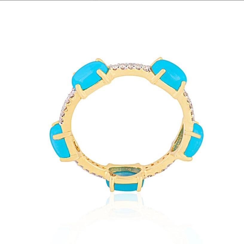 This stunning designer handmade ring is made from 14K yellow gold and features turquoise gemstone. 

Specifications:

Dimensions: Ring Size-7.25 US, Width-5MM
Gross Weight: 7.36 gms
Gold Weight: 1.838 gms
Gold Purity: 14K Yellow Gold
Diamond Weight: