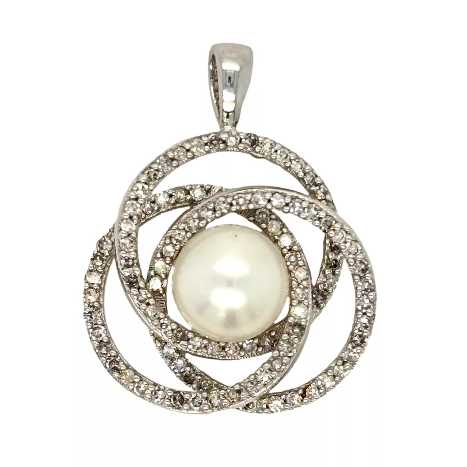 Offered is a beautifully sculpted diamond pavé knot pendant, crafted in solid 14K white gold, showcasing a luminous Akoya cultured pearl at its center. The design features an interwoven open-knot motif, fully set with natural round diamonds, adding