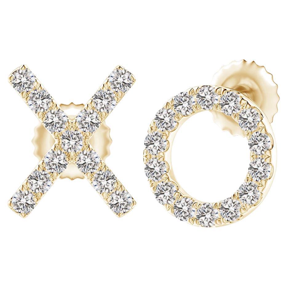 Clous d'oreilles XO en or jaune 14 carats avec diamants naturels (0,2 cttw)  I+I-J) en vente