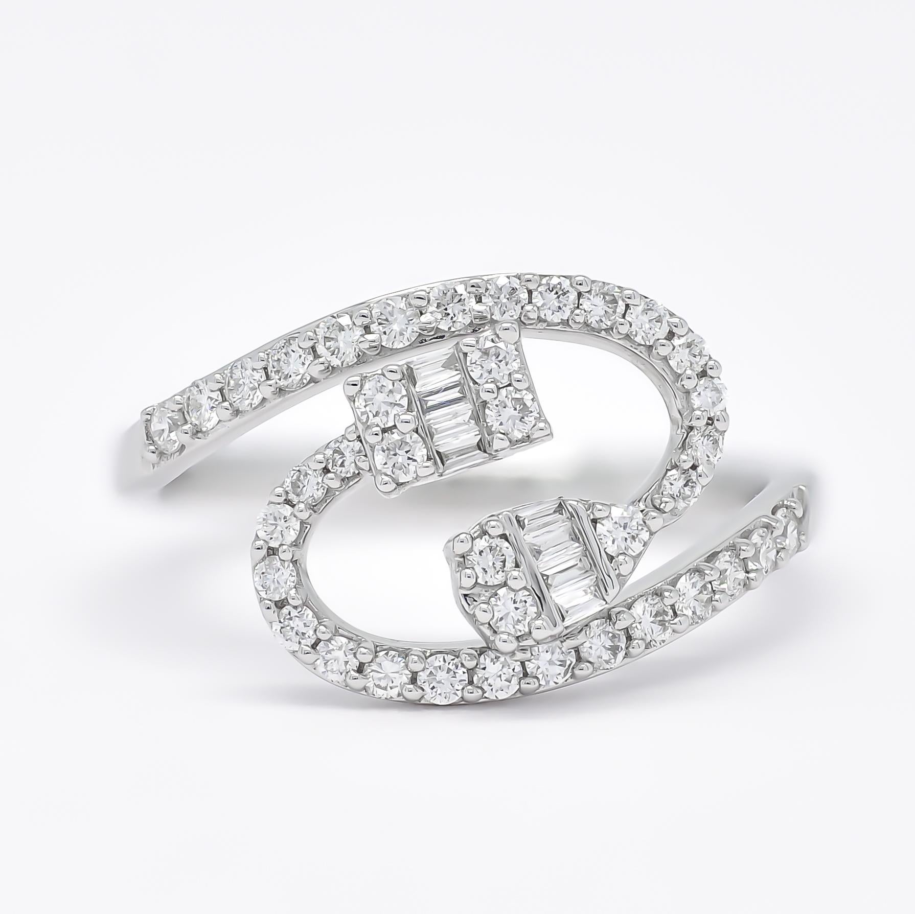 Dazzling Baguette and round-cut diamonds form a spectacular cluster in this stunning white gold duo cluster ring in Bypass Spilt Shank.  The Cluster are in a shape of a square and also pear, giving an illusion of solitaire Diamonds.

Astounding