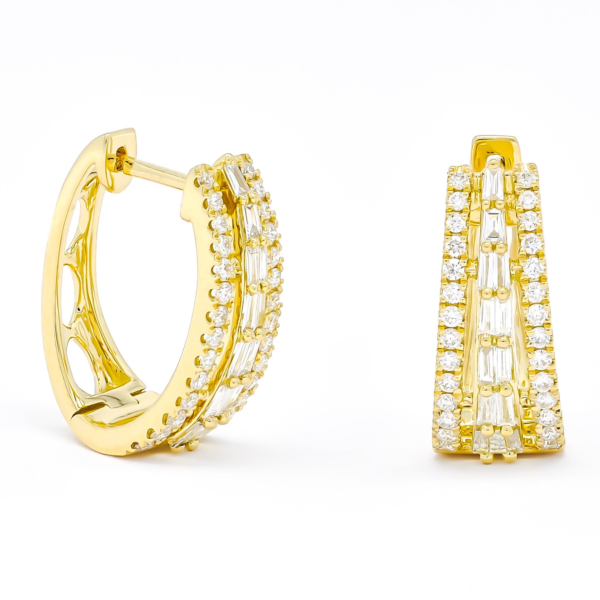 Elevate your style with sophistication and grace wearing these exquisite hoop earrings, adorned with brilliant baguette and shimmering round-cut diamonds set in gleaming 18 KT Yellow Gold.

Totaling 0.76 carats, the diamonds in these designer hoops