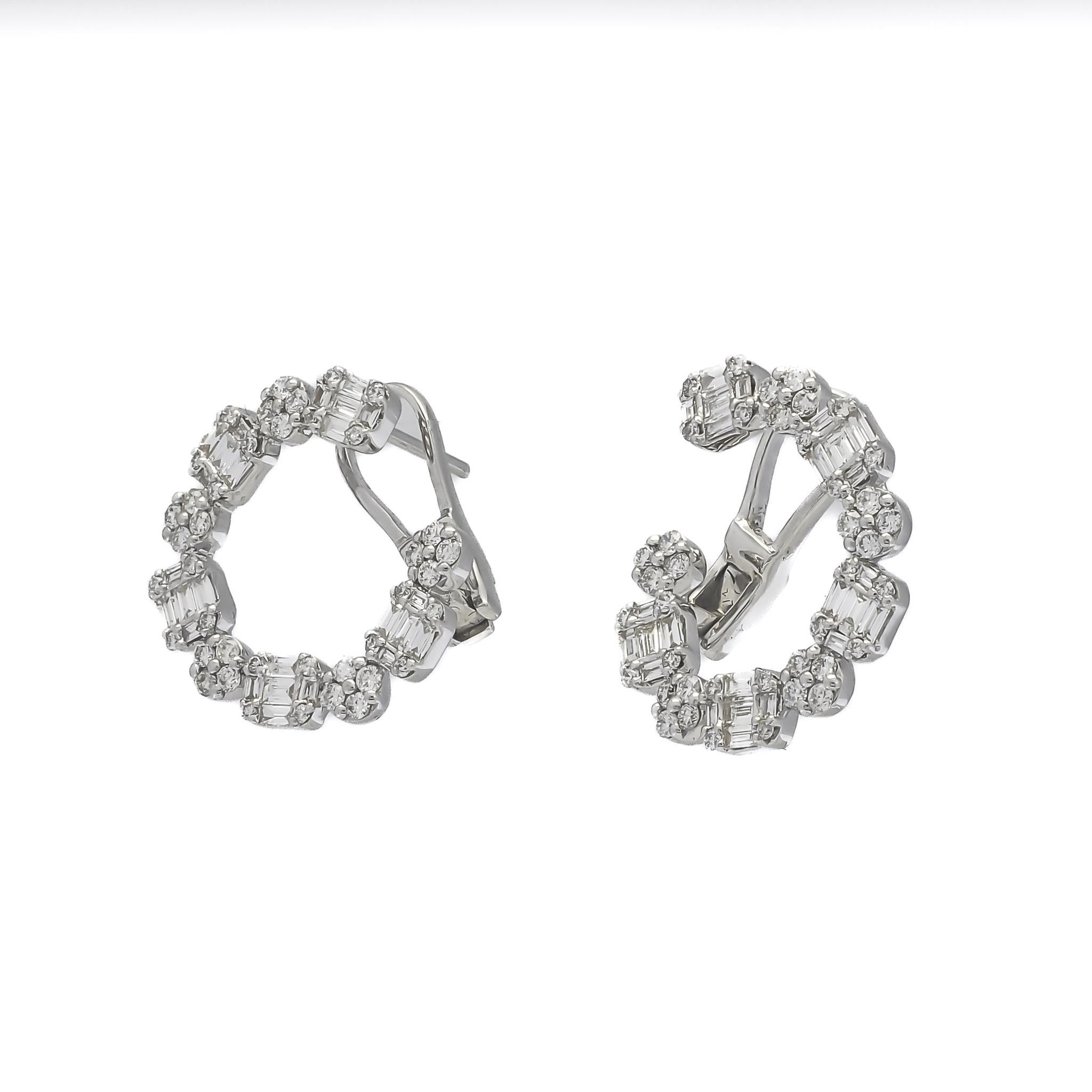 These Diamond cluster in these 18KT White Gold Illusion Hoop Earrings is an artistic masterpiece, showcasing a thoughtful arrangement of natural diamonds. These clusters are a crucial part of the illusion setting that is designed to maximize the