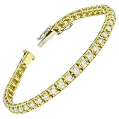 Bracelet tennis à quatre griffes en or jaune 18 carats avec diamants naturels de 2,82 carats