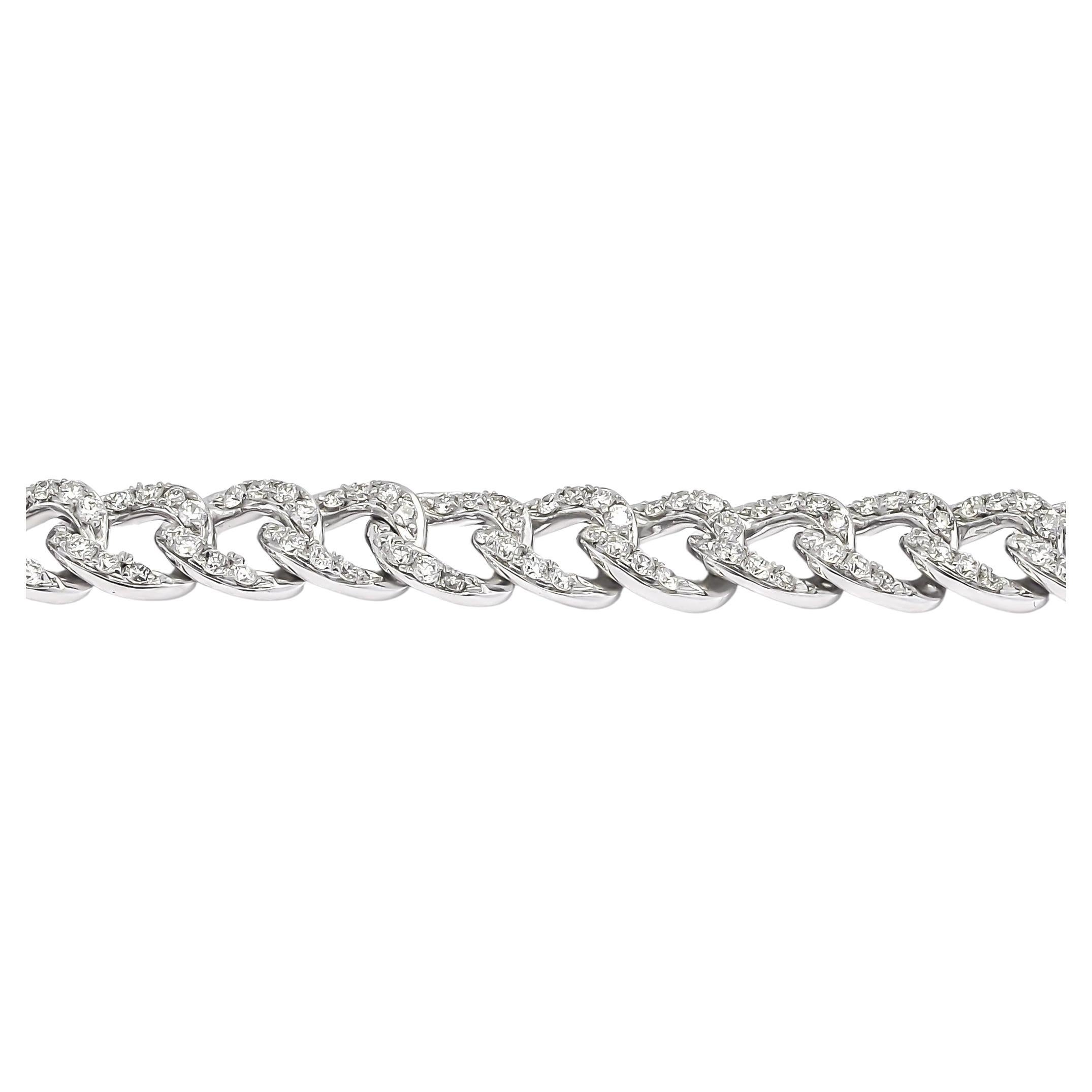 Set within this robust chain are dazzling diamonds, collectively weighing 1.50 carats. These brilliant-cut gems catch the light with every movement, creating a symphony of sparkle and fire. Each diamond is meticulously set, ensuring maximum