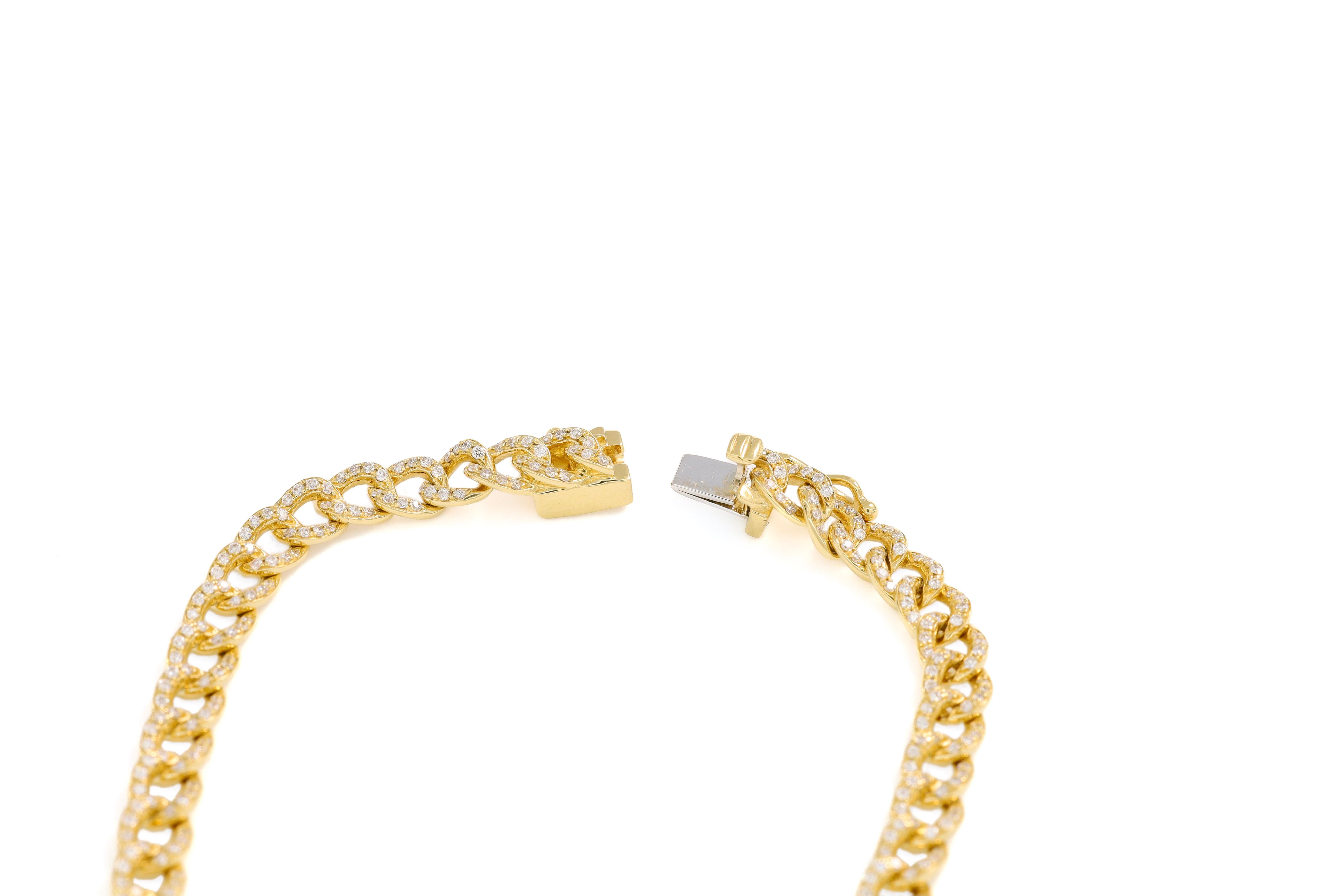 Set within this robust chain are dazzling diamonds, collectively weighing 1.50 carats. These brilliant-cut gems catch the light with every movement, creating a symphony of sparkle and fire. Each diamond is meticulously set, ensuring maximum