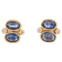 Clous d'oreilles en or jaune 18 carats avec double pierre de saphir bleu et diamant