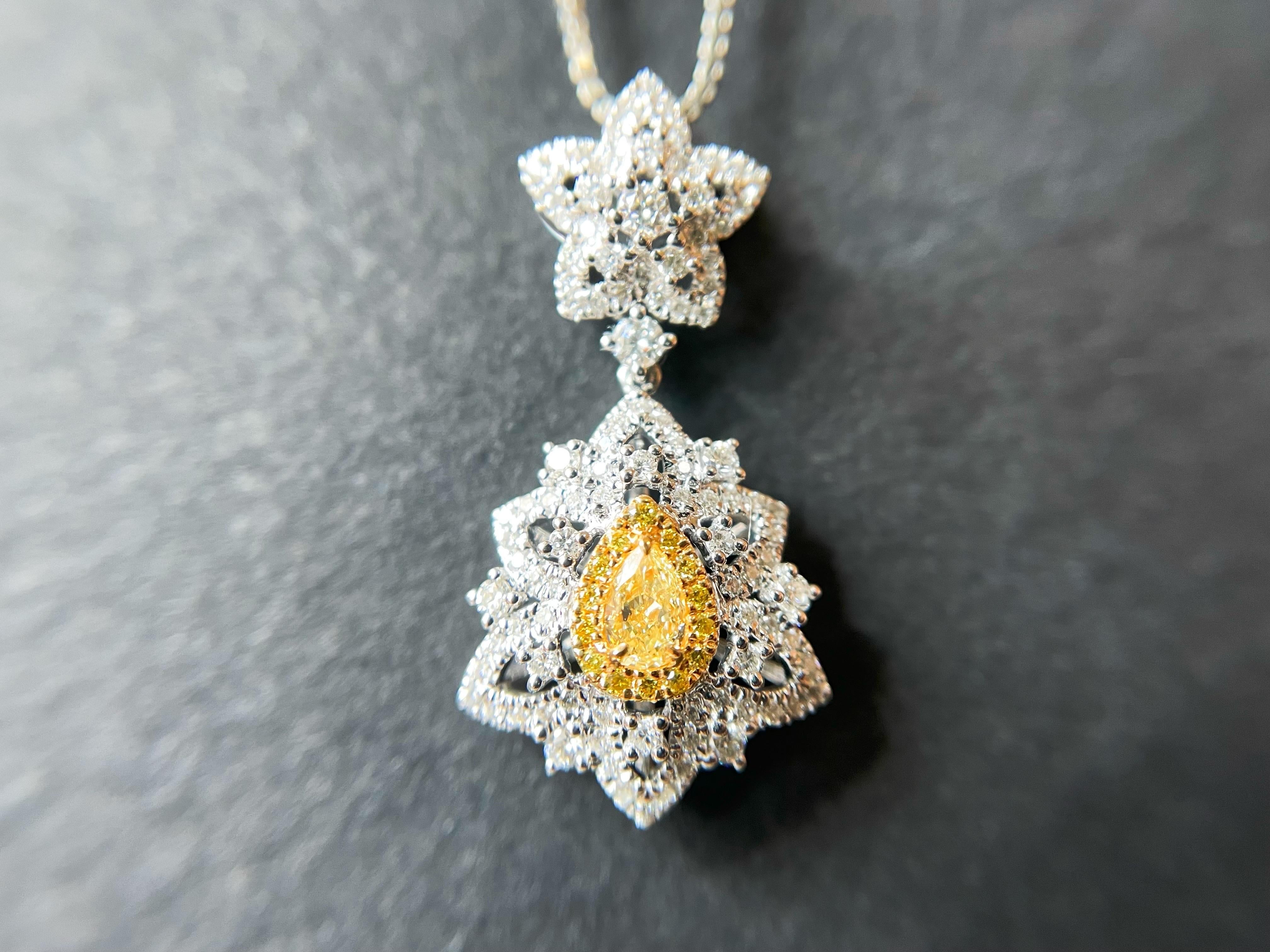 Introducing our extraordinary Spring Floral Pendant, a true embodiment of beauty and grace. This stunning piece features a captivating combination of the finest round brilliant cut diamonds in 18k white gold, depicting a delicate floral motif that