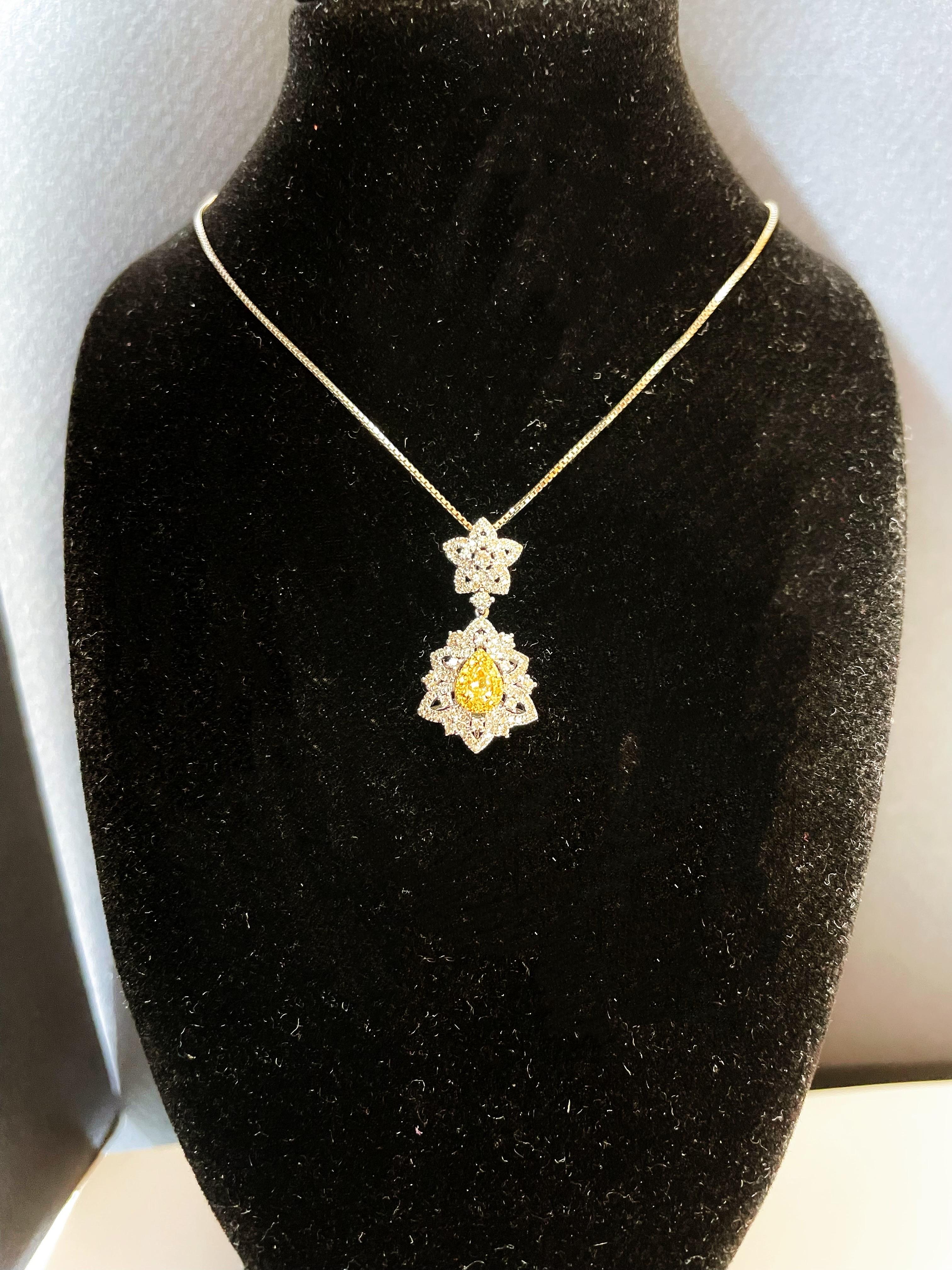 Natural Drop Shape Yellow Diamond Pendant set in 18K White Gold with Diamond  For Sale 2