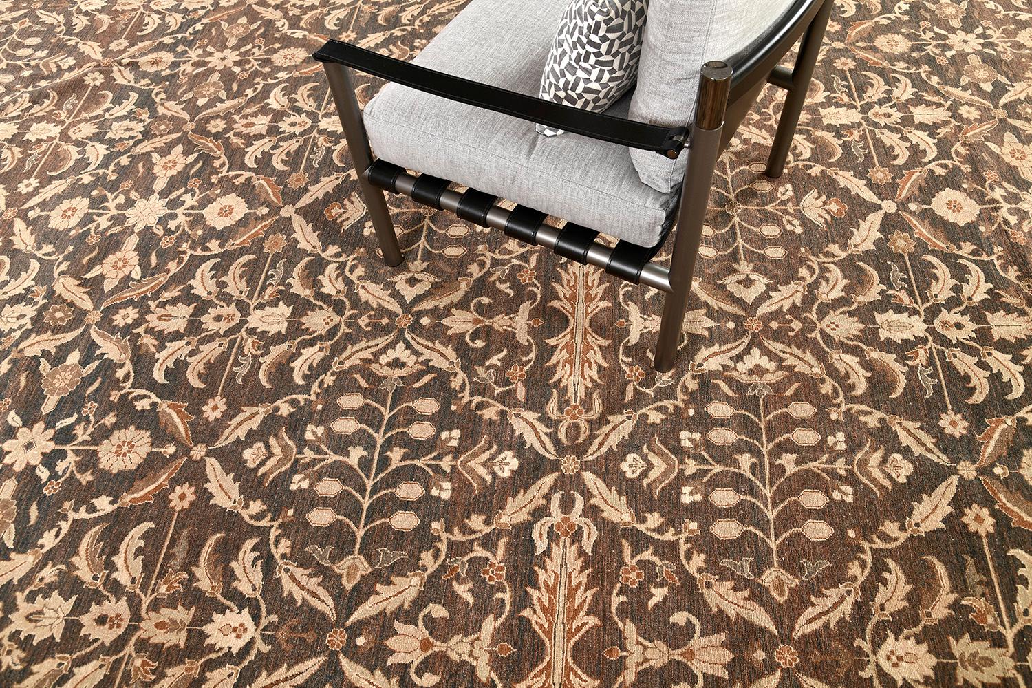 The architectural elements of naturalistic forms, this revival of Amritsar rug in Bliss Collection astounds with its beauty. The all-over pattern of various botanical patterns of blooming palmettes, graceful peonies and serrated leaves a graceful