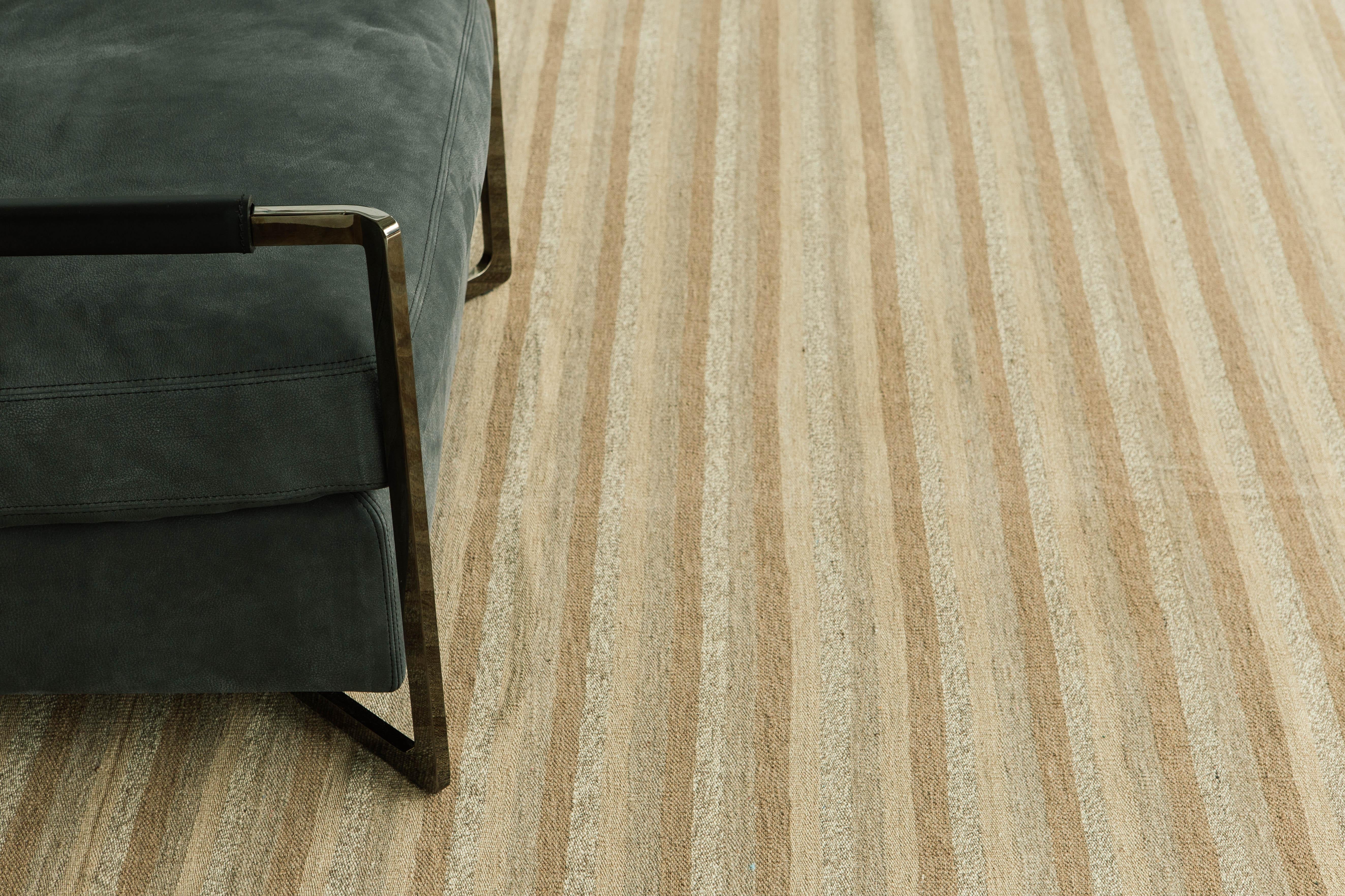 A natural dye flat-weave Kilim in a neutral stripe pattern. This flat-weave is made up of natural wool that create an interesting texture and vibe. A simple yet interesting rug that will elevate any design space.

Rug number 24733
Size 8' 0