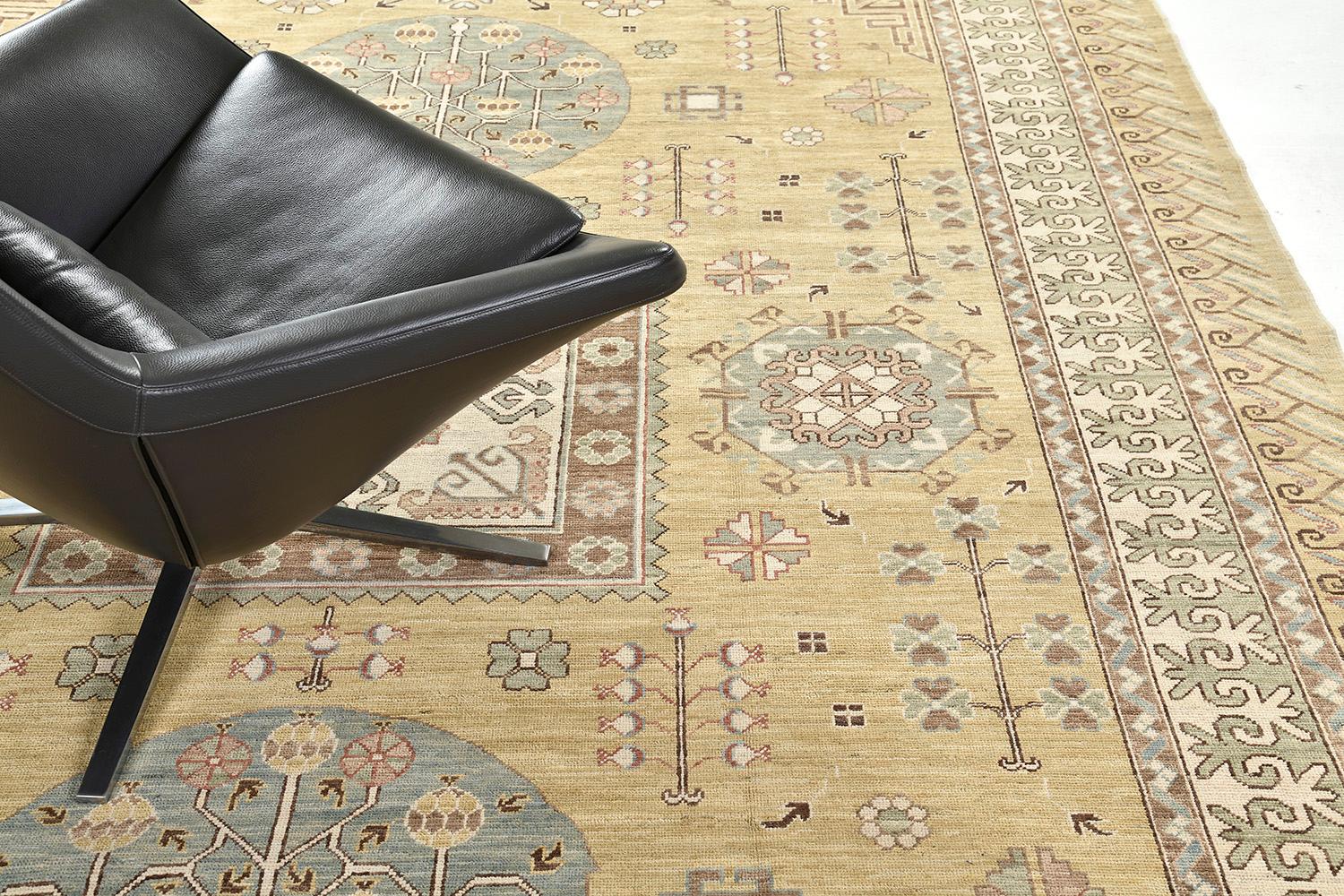 A well-designed modest revival of a Khotan Design rug is ideally suited for a ceiling to a floor wall piece. Grandiose medallions and motifs are embellished at the center and surroundings. From borders to the field, it compliments every single