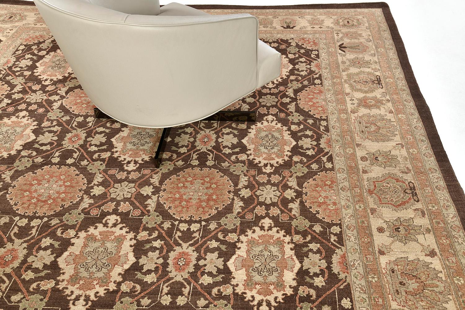 This majestic Mahal rug has created an impressive pattern. Featuring the well-coordinated autumn vibes and the muted palette consisting of sand and tan, this elegant rug is composed of enchanting florid elements forming different grandiose