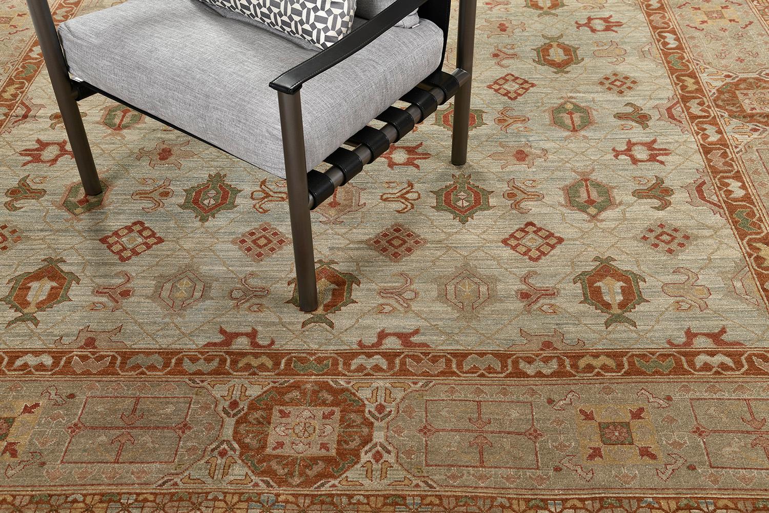 A classic revival of Mamluk rug is phenomenal with traditional style. An oversized rug that has neutral colors of sepia. Medallions and blooming ornaments are symmetrically aligned and well-coordinated.  Your guests will be fascinated with this