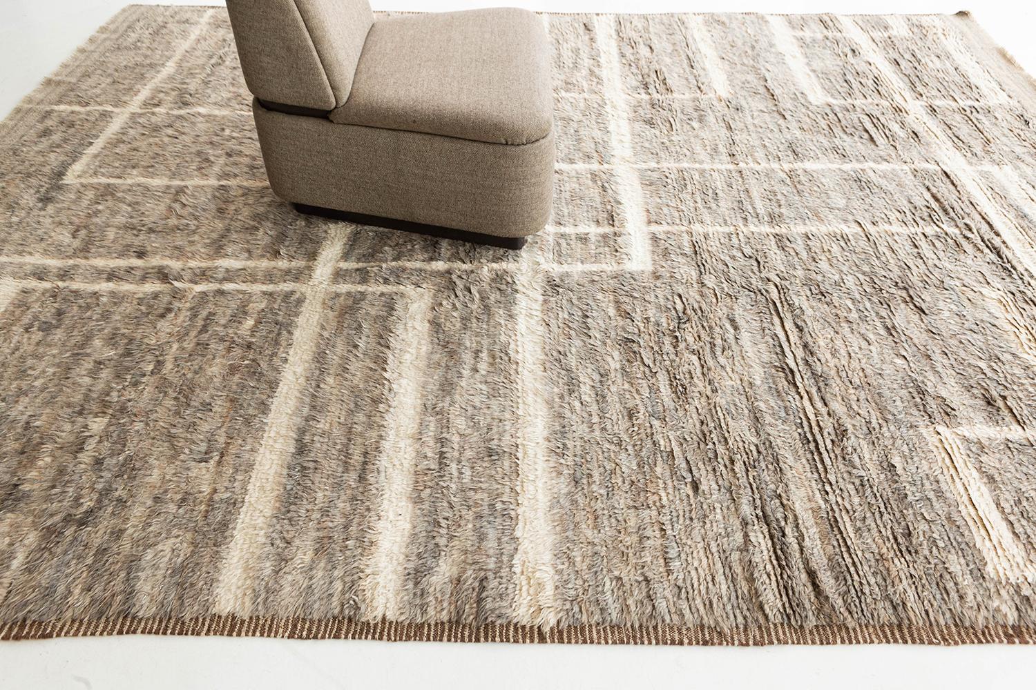 A contemporary natural dye Moroccan inspired rug from our Atlas Collection. This natural taupe-gray wool pile weave is adorned with interlocking ivory lines. A beautiful pile weave that will enhance any design space. 


Rug number 26926
Size 9'