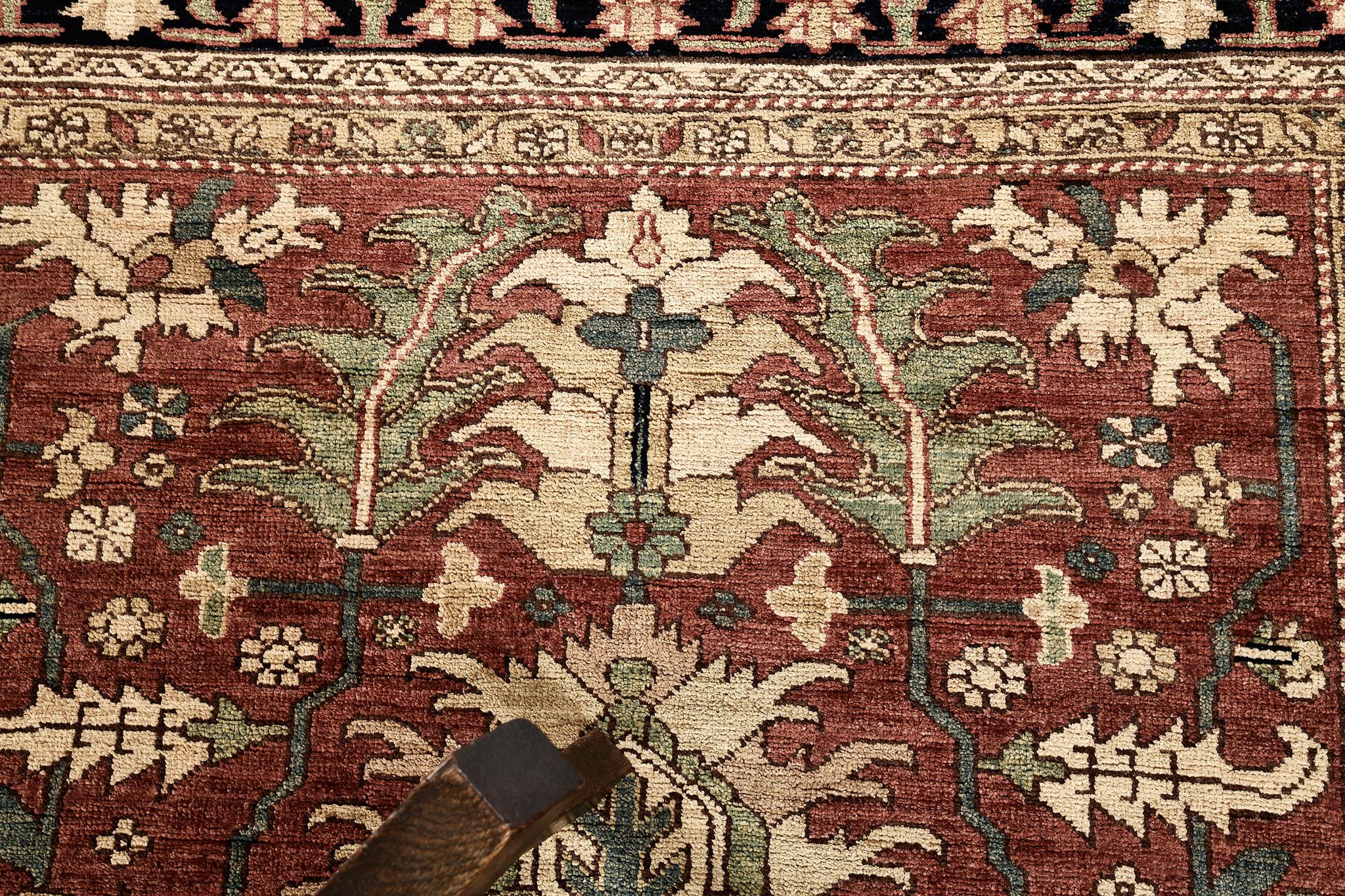 Series of medallions, green leafy ornaments, and florid elements are reflected through dazzling velvet red field. The borders are beautifully hand-woven that was made using vegetable dye to form an amazing Serapi Design Rug. Truly a creation that