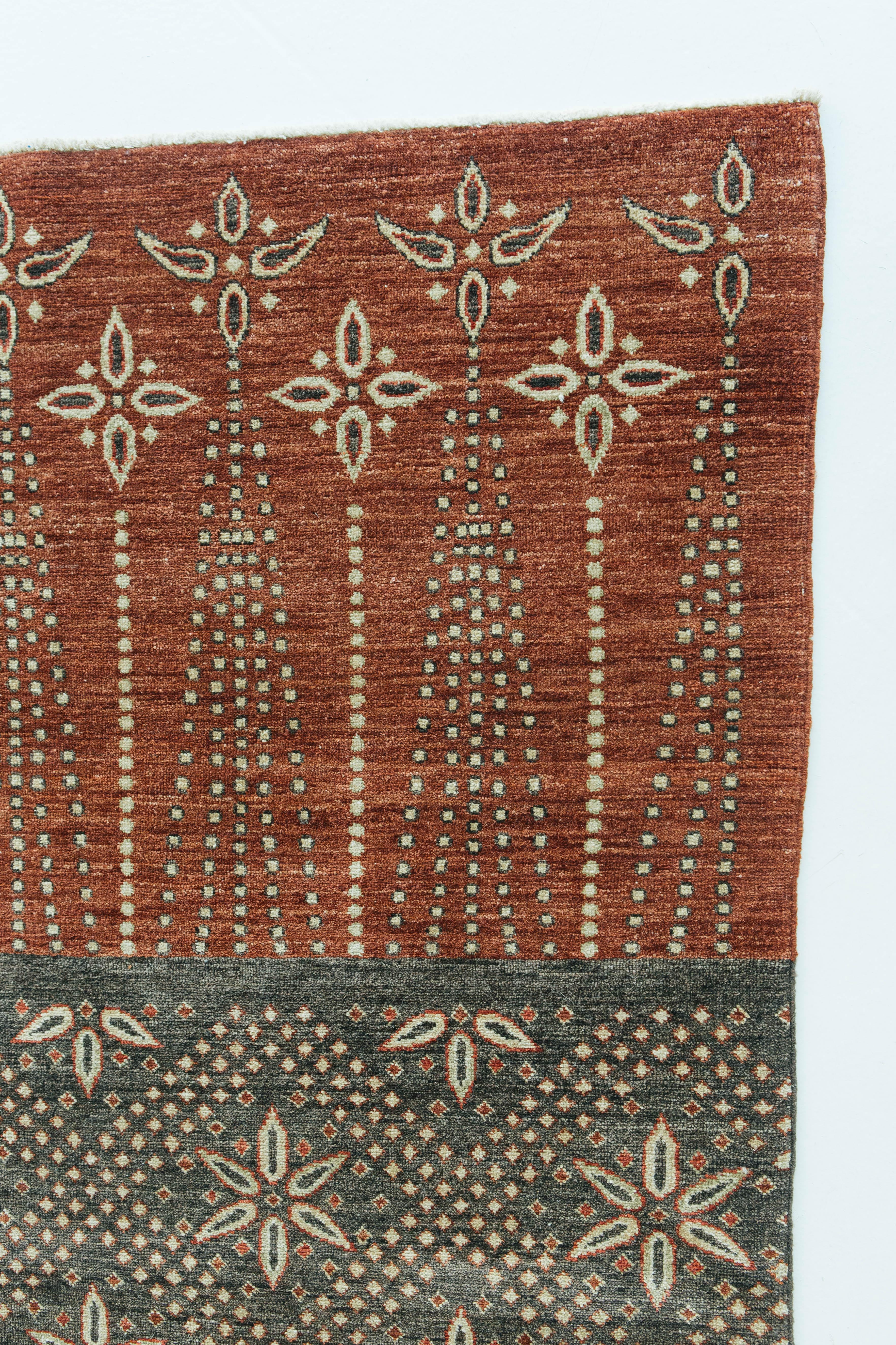 A natural dye Shawl design recreation with beautiful floral blocking and tribal patterns. The red, brown, and golden ivory colors work cohesively to make this Indian Shawl textile design filled with warmth and spontaneity.


Rug number
