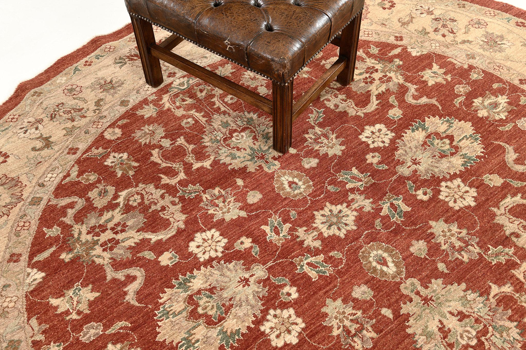 Series of magical vines and florid ornaments are reflected through gold embellishments to blooming and dazzling dusty red fields. The borders are beautifully hand-woven that created from a vegetable dye to form an elegant Sultanabad Round Rug. Truly