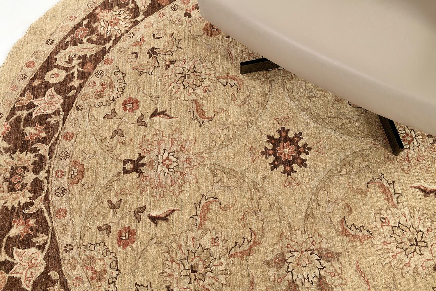 Series of magical vines and florid ornaments are reflected through golden embellishments to blooming and calming warm fields. The borders are beautifully hand-woven that created from a vegetable dye to form an elegant Sultanabad Round Rug. Truly a