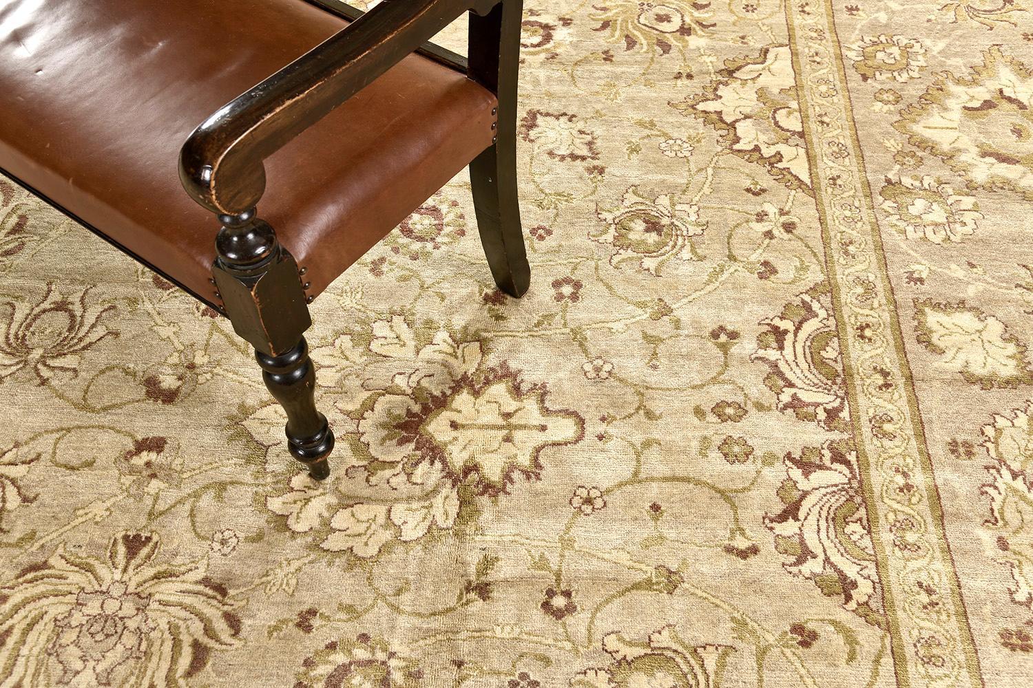 This luxurious revival of Sultanabad is nothing shy of elegance and artistry. This traditional masterpiece encompasses beautiful floral scrolls and traditional Persian designs in neutral tones with golden outlines. This rug is suitable for both