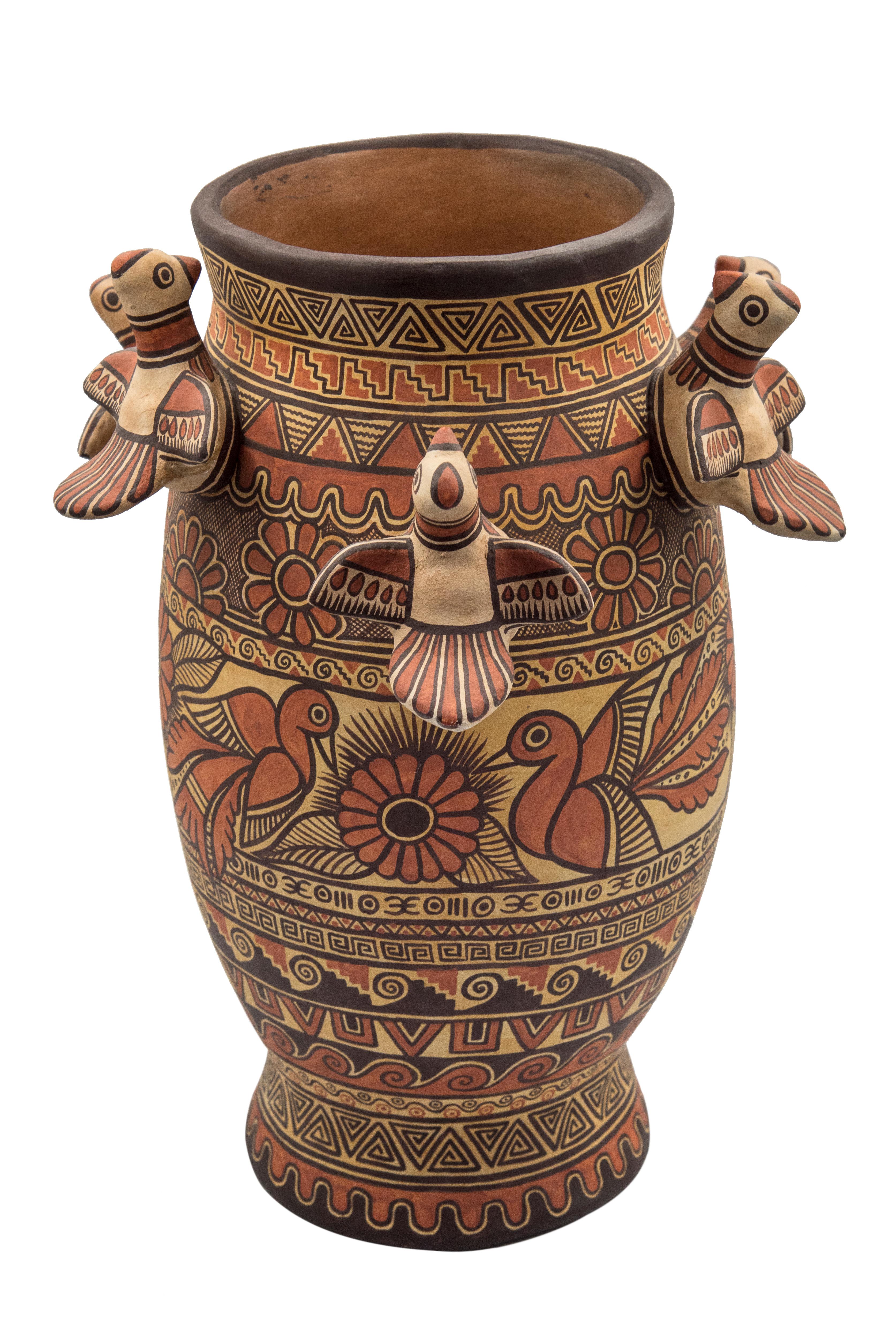 Beautiful natural clay vessel made in Izucar de Matamoros, in the state of Puebla México. Hand painted using natural dyes by master artisan Marco Antonio Castillo, son of renowned artists, Alfonso Castillo. This rustic Mexican ceramic vase portraits