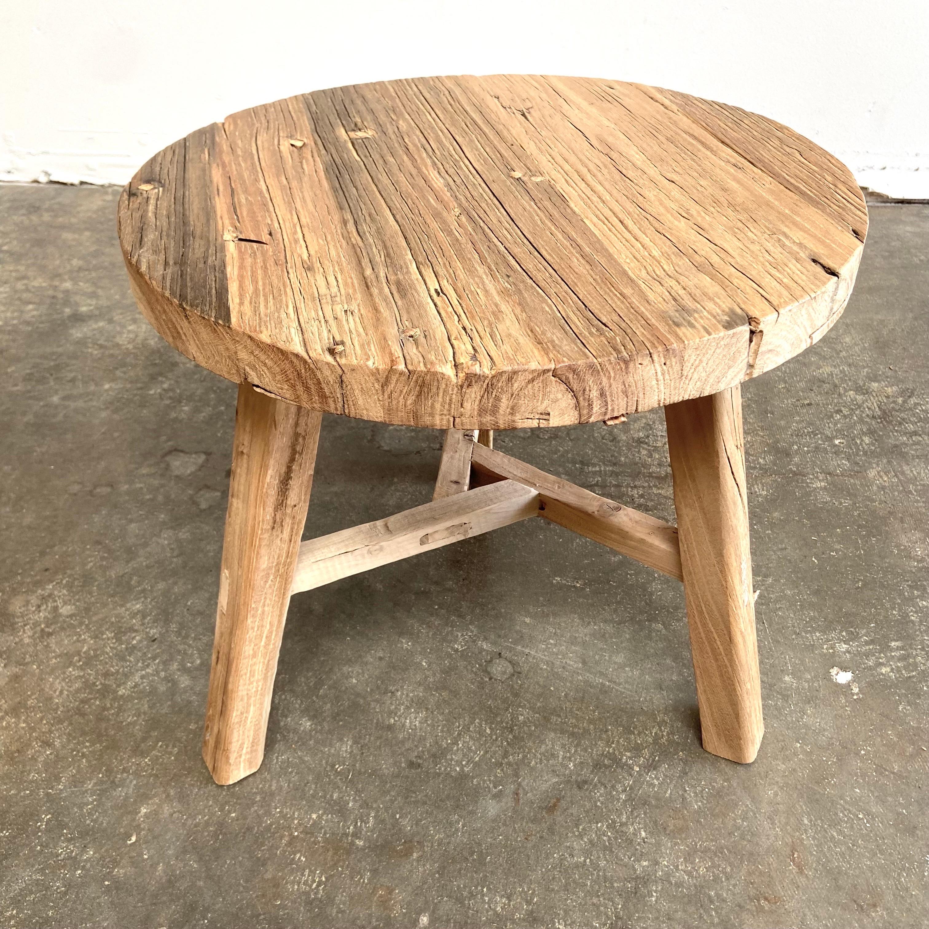 Round Elm wood side table multiple quantities available. Natural raw patina, solid elm wood, made by bloom home inc. Solid and sturdy, great for use next to a sofa, in between chairs, in a bath, or bedside.

Elm side table 20” rd. X 19”h