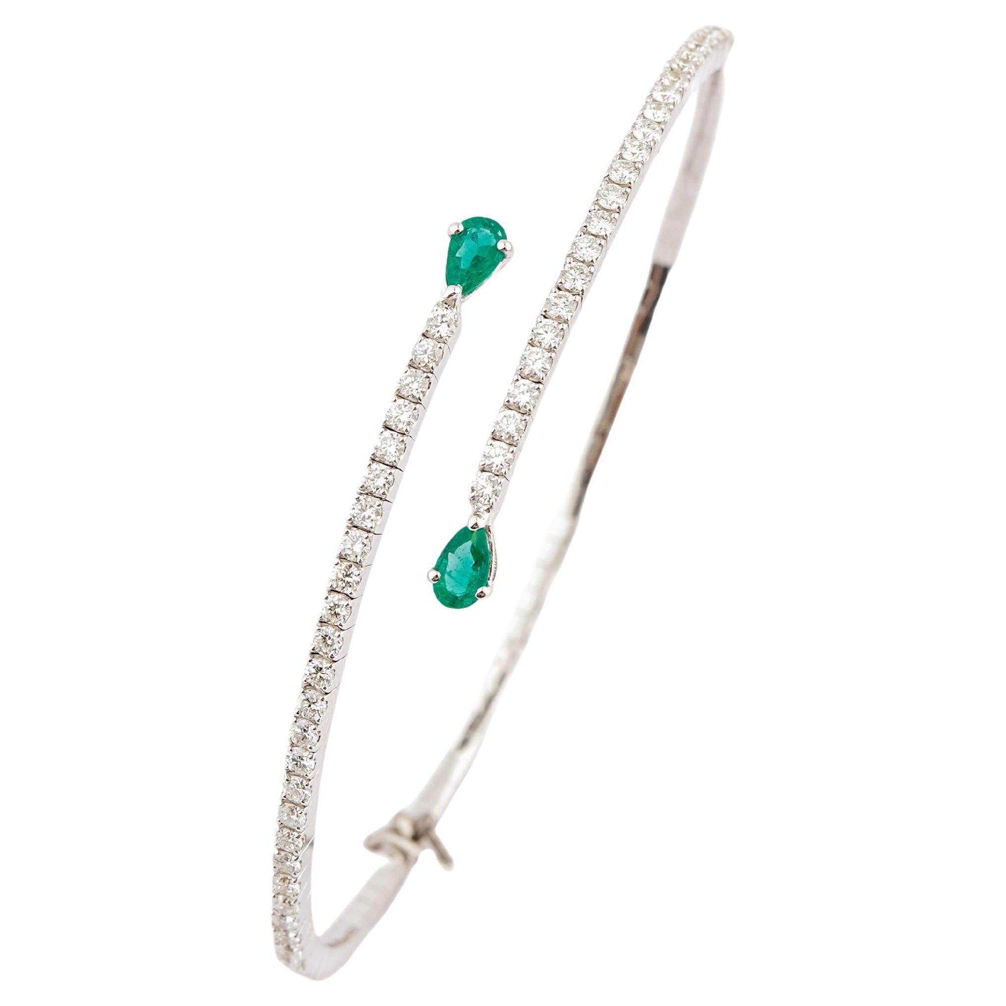 Esmeralda natural 0,45cts, diamante 1,08cts en oro de 18k en venta
