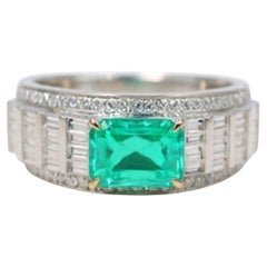 Natural Emerald 0.70cts Diamond 0.64cts Ring in 14k Gold