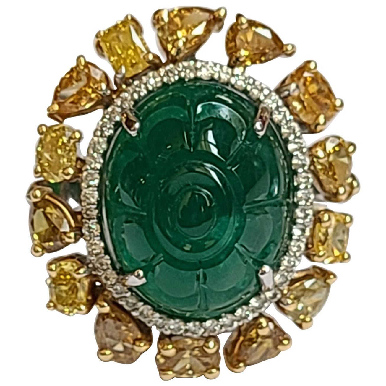 Natural Emerald 10.20 Carat Ring Set in 18 Karat Gold with Fancy Color Diamond