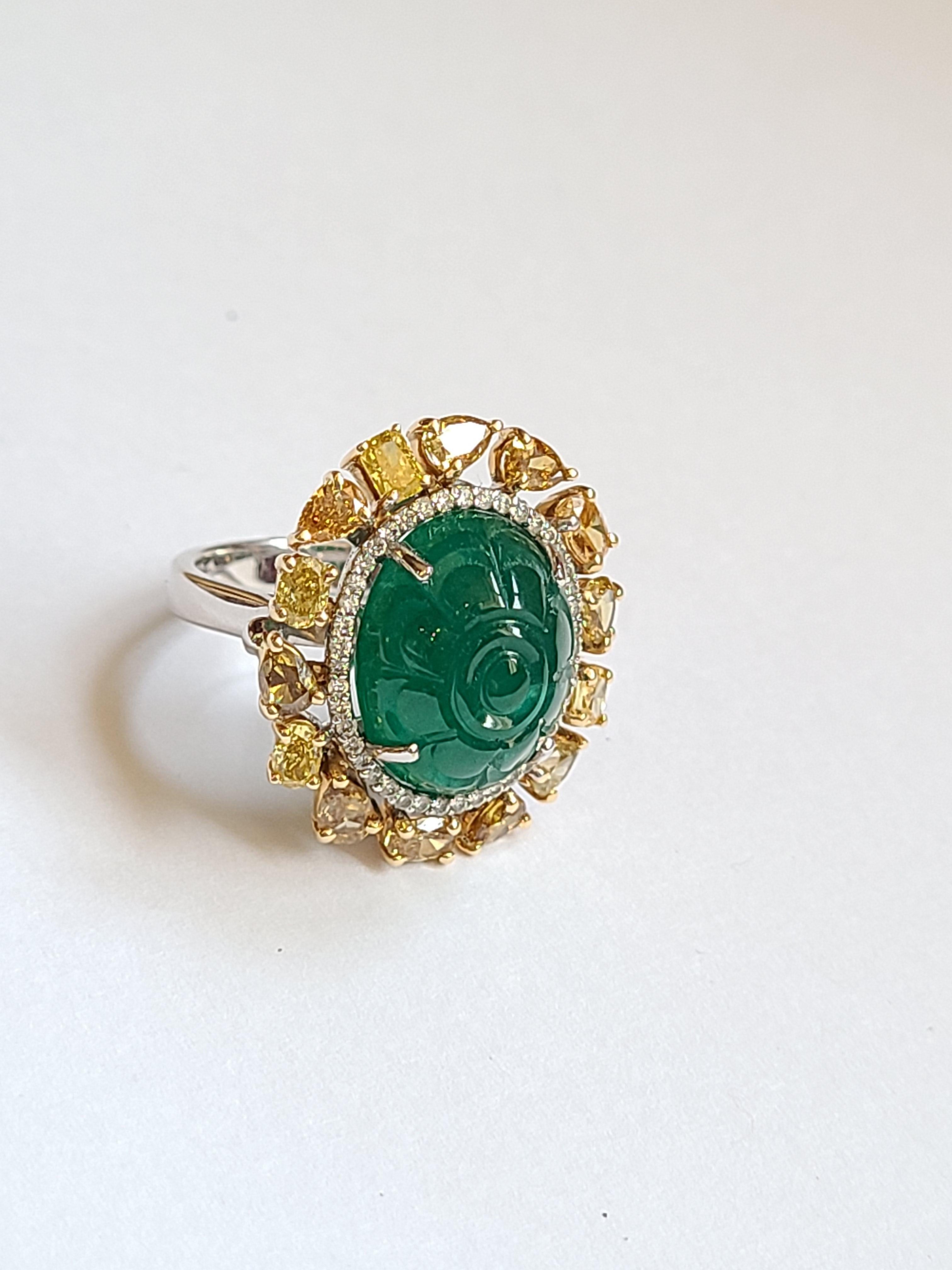 Modern Natural Emerald 10.20 Carat Ring Set in 18 Karat Gold with Fancy Color Diamond