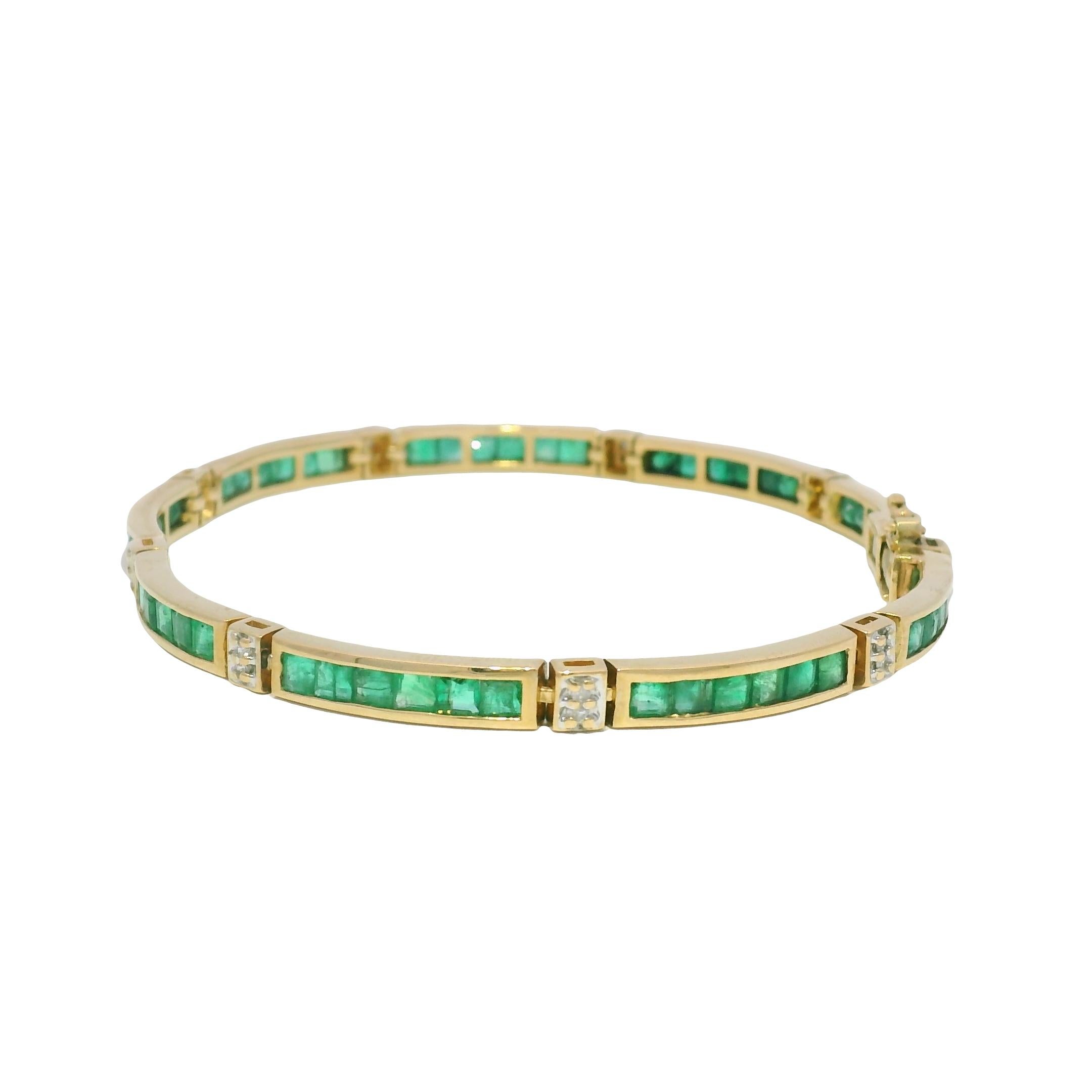 14k Yellow Gold Emerald Channel Set Station Bracelet

Material: 14k Yellow Gold
Gemstone Details: 
There are approximately 1.50 carats of natural, square cut emeralds. 
There are a smaller number of diamonds also and they are approximately G/H in