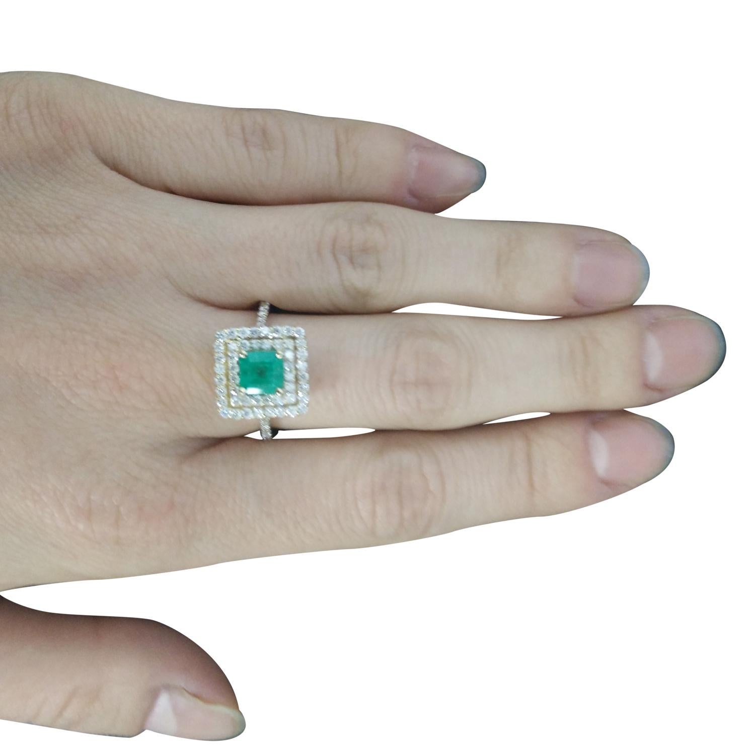 1.55 Carat Natural Emerald 14 Karat Solid Yellow Gold Diamond Ring
Stamped: 14K 
Ring Size: 7 
Total Ring Weight: 4.2 Grams 
Emerald Weight: 0.85 Carat (5.50x5.50 Millimeters)  
Color: Green
Shape: Emerald 
Treatment: Oiling
Diamond Weight: 0.70