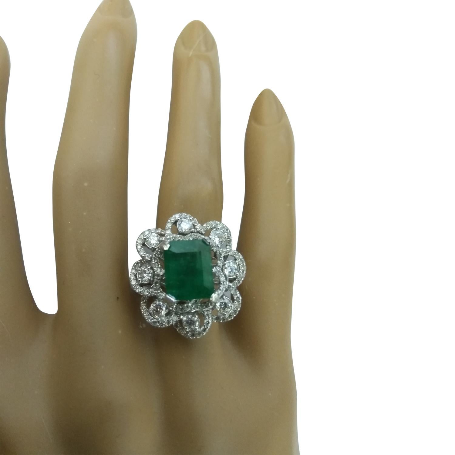 4.70 Carat Natural Emerald 14 Karat Solid White Gold Diamond Ring
Stamped: 14K 
Total Ring Weight: 7.8 Grams 
Emerald Weight 3.45 Carat (9.50x7.50 Millimeters)
Diamond Weight: 1.25 carat (F-G Color, VS2-SI1 Clarity )
Face Measures: 21.90x20.35