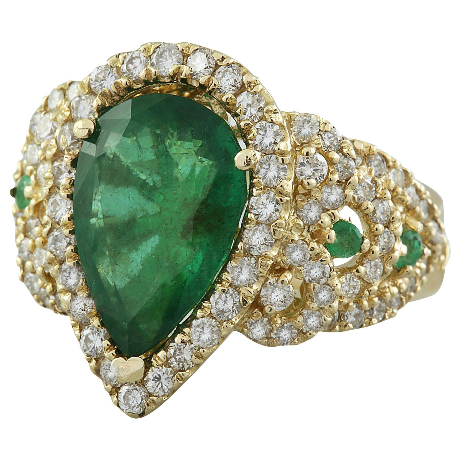 7.25 Carat Natural Emerald 14 Karat Solid Yellow Gold Diamond Ring
Stamped: 14K 
Total Ring Weight: 9 Grams
Emerald Weight 5.25 Carat (13.00x9.00 Millimeters)
Diamond Weight: 2.00 carat (F-G Color, VS2-SI1 Clarity )
Face Measures: 18.85x13.35