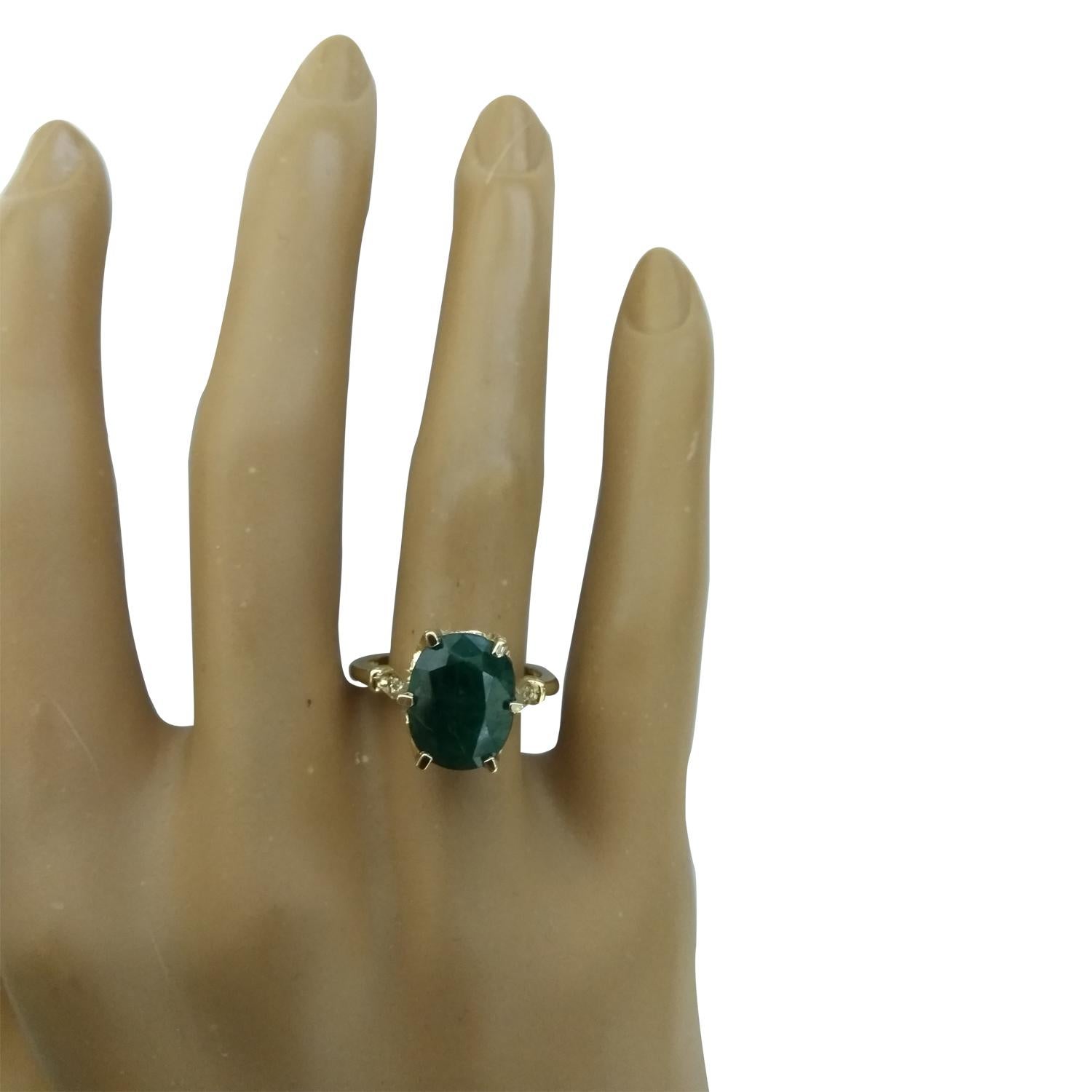 3.64 Carat Natural Emerald 14 Karat Solid Yellow Gold Diamond Ring
Stamped: 14K 
Total Ring Weight: 4.3 Grams 
Emerald Weight 3.58 Carat (11.00x9.00 Millimeters)
Diamond Weight: 0.06 carat (F-G Color, VS2-SI1 Clarity )
Face Measures: 11.00x9.00