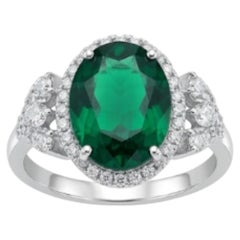 Natural Emerald 3.35CTS & Diamond 0.80CTS Ring in 18k Gold