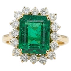 Natural Emerald 6.54CTS & Diamond 1.25CTS Ring in 18k Gold