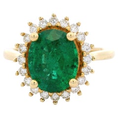Natural Emerald and Diamond Halo Ring, 2.55 Carat Oval in 14K Yellow Gold