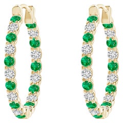 Orecchini a cerchio con diamante e smeraldo naturale in oro giallo 14K (1,5 mm)