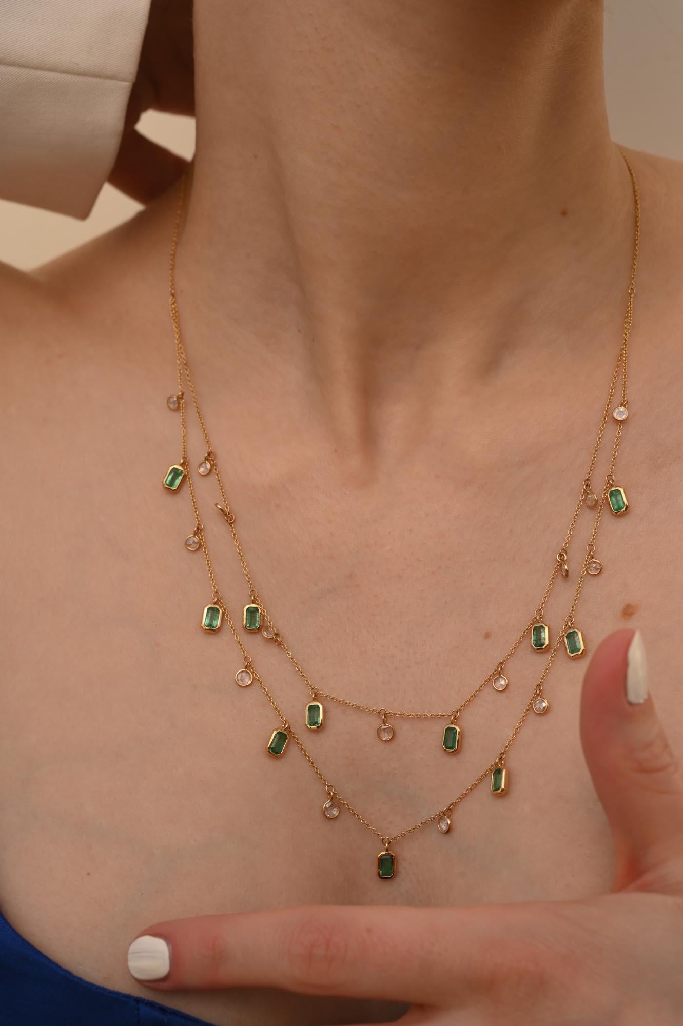 Natural Diamond Emerald Double Chain Necklace studded with emerald and diamond in 18K Gold. This stunning piece of jewelry instantly elevates a casual look or dressy outfit. 
Emerald enhances the intellectual capacity. 
Designed with octagon cut