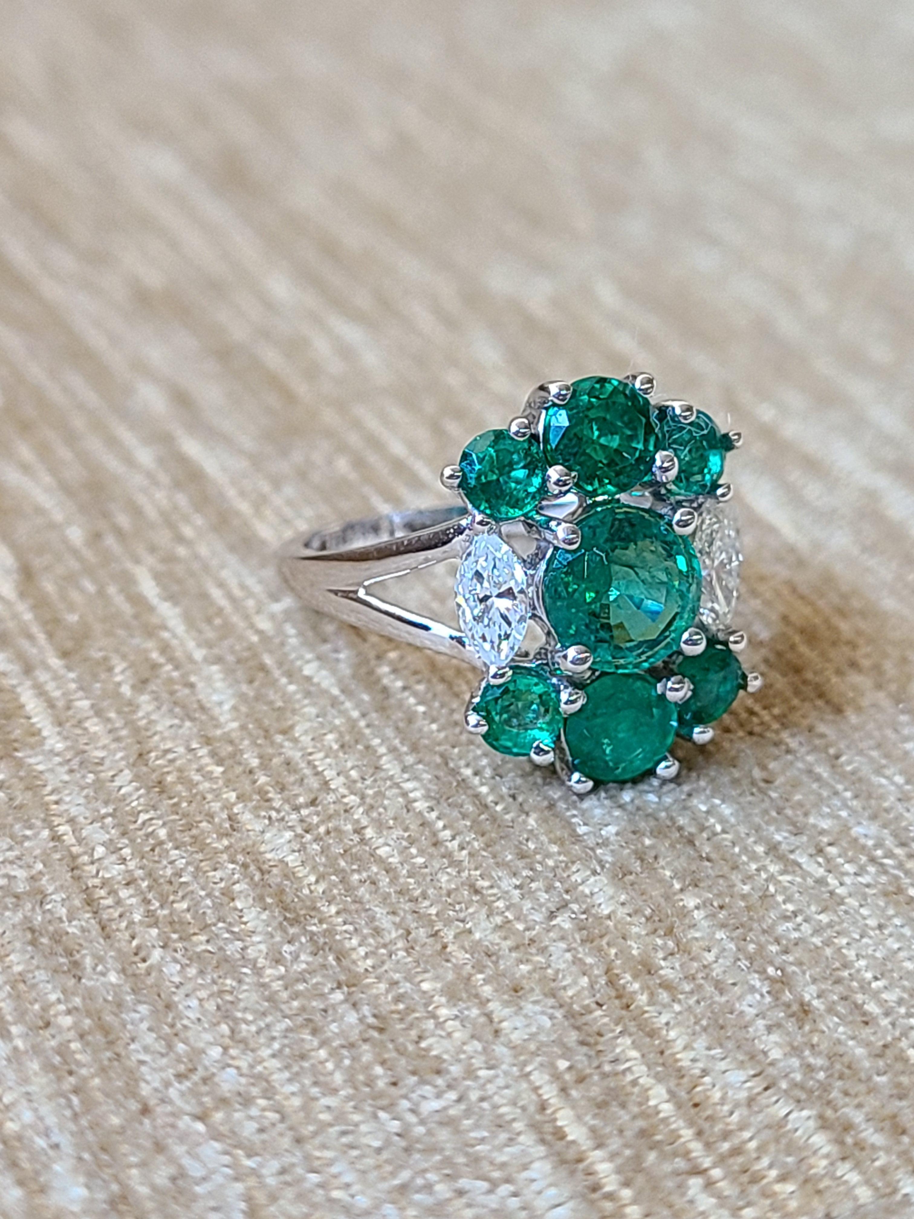 A modern and chic emerald and diamond ring set in 18K white gold . The emerald is natural and weight is 2.35 carats and natural diamond weight is .38 carats. The net gold weight is 3.724 grams and ring dimension in cm 1.60cm x 1.20cm x 2.30cm (L x W