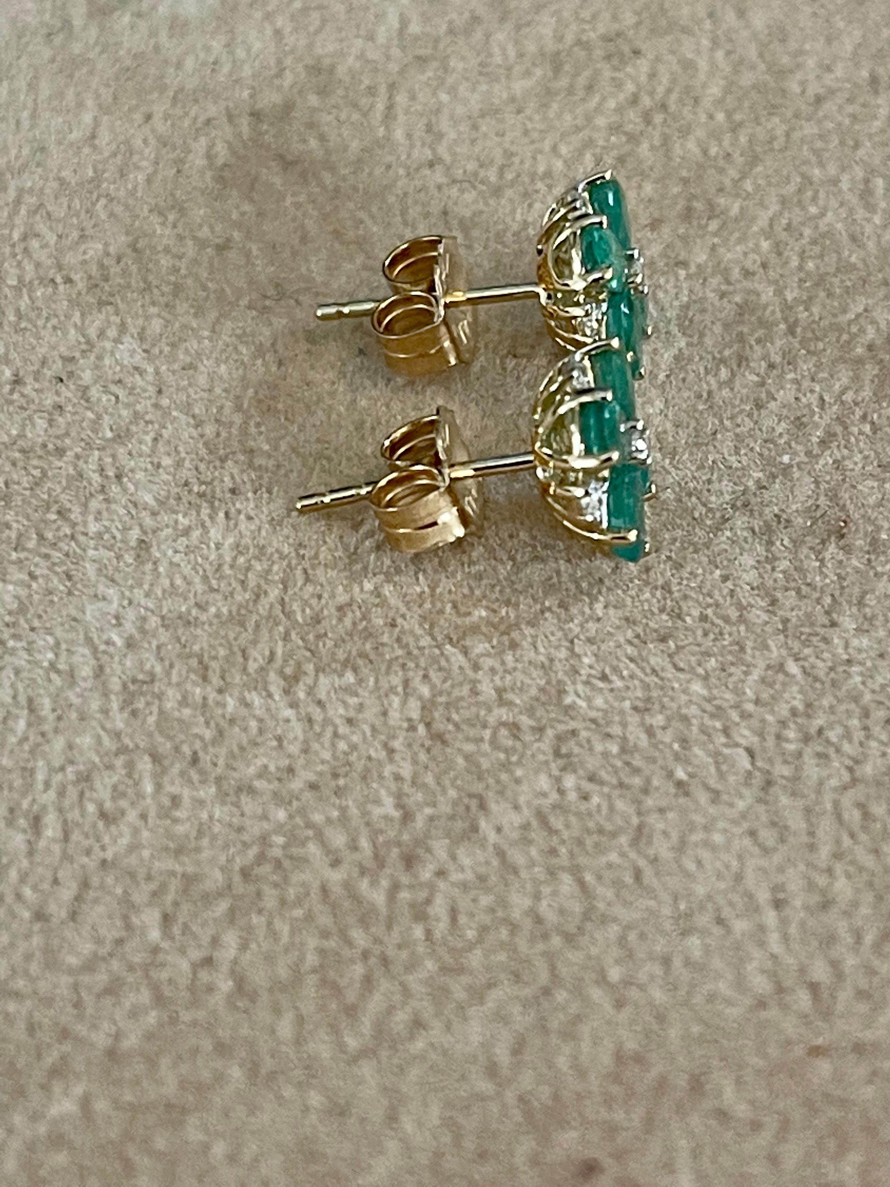 Oval Cut Natural Emerald and Diamonds Flower Post Earrings 14 Karat Yellow Gold