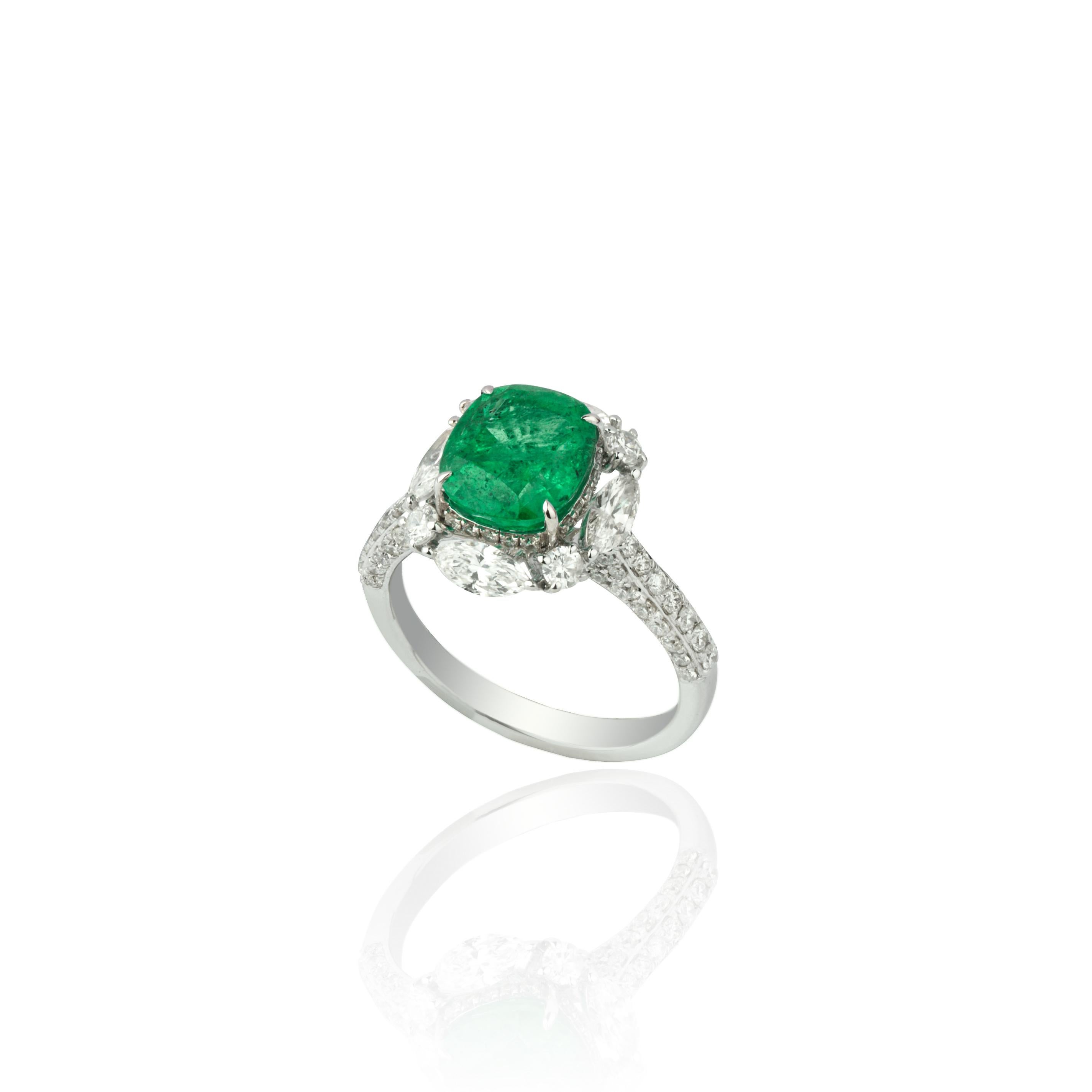 Introducing our exquisite 18 Karat White Gold Ring featuring a stunning 2.77 carat natural Zambian Emerald and  1.55 carats of diamonds. This ring is truly remarkable, showcasing the beauty of the emerald and the brilliance of the diamonds.

Crafted