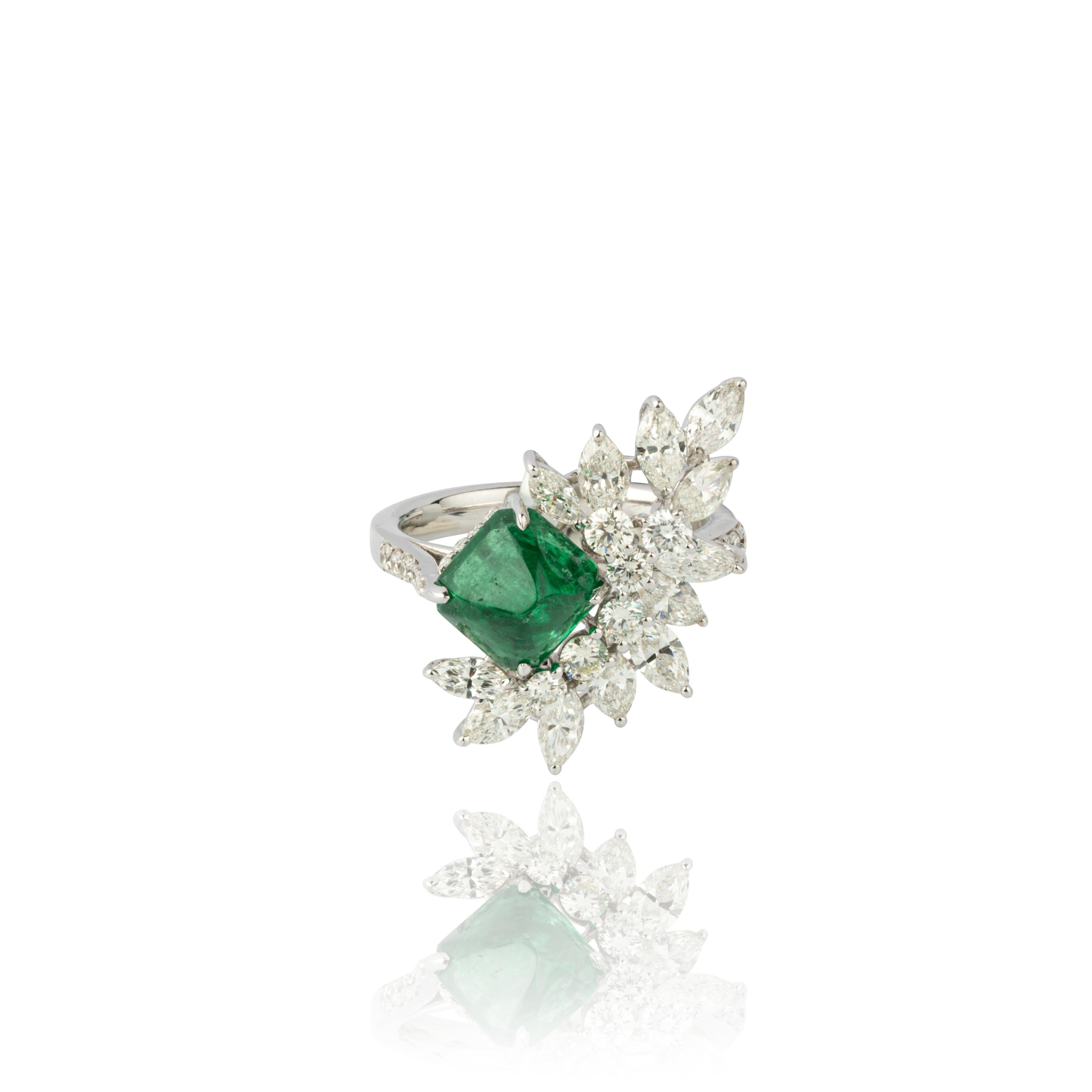 Introducing our exquisite 18 Karat White Gold Ring featuring a stunning 2.34 carat natural Zambian Emerald and 2.15 carats of diamonds. This ring is truly remarkable, showcasing the beauty of the emerald and the brilliance of the diamonds.

Crafted