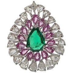 Natural Emerald and Pink Sapphire Ring with Diamonds Set in 18 Karat Gold