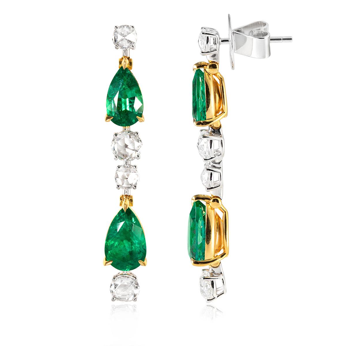 Natural Colombian pear shaped emerald and rose cut diamond drop earrings in 18ct yg/wg. They have post and butterfly fittings, the post attached to the top rose cut diamond. The earrings measure approximately 40mm in length.
4 pear shaped emeralds