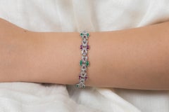 Natürliches Smaragd- und Rubin-Gliederarmband mit Diamanten aus 18 Karat Weißgold