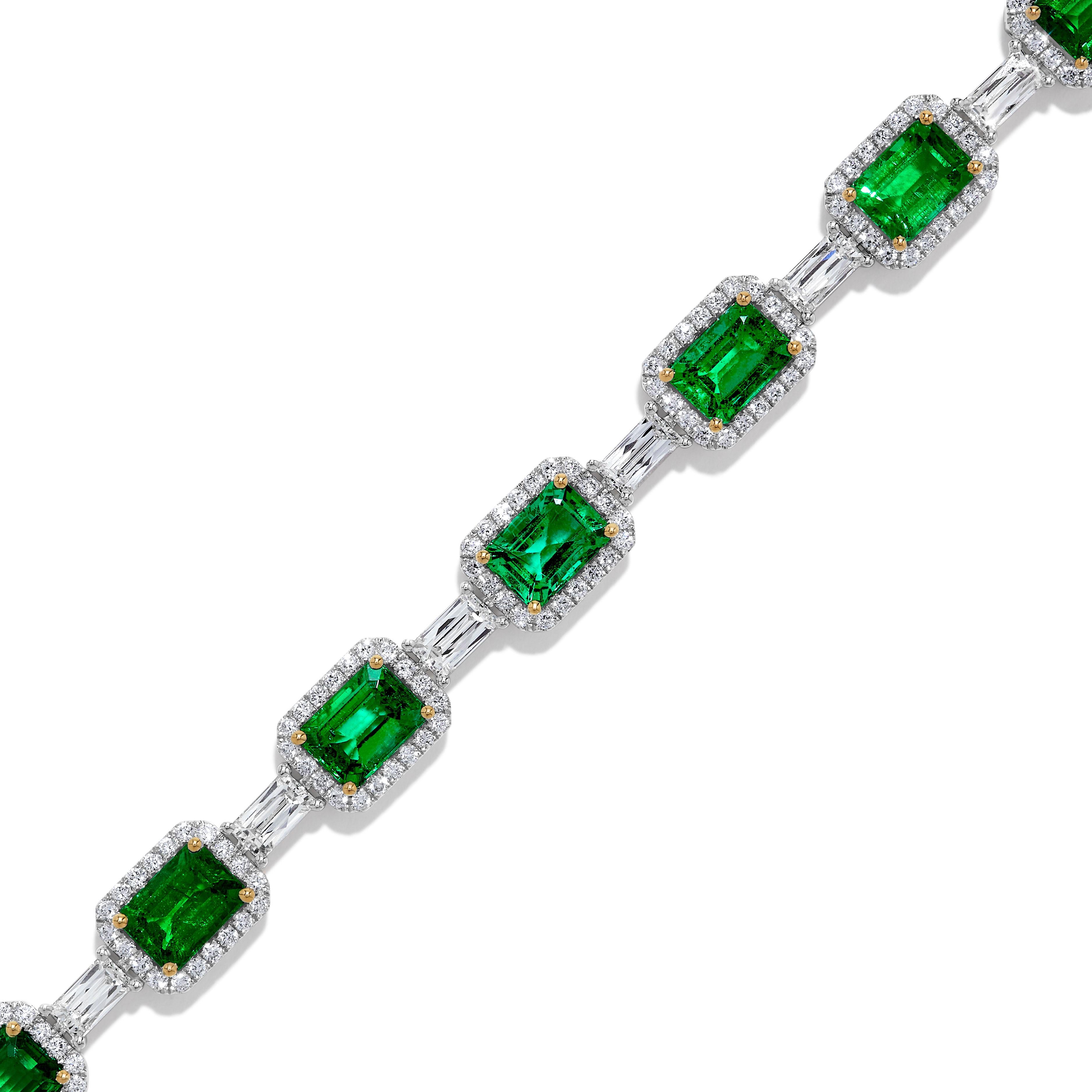 RareGemWorld's classic emerald bracelet. Mounted in a beautiful 18K Yellow and White Gold setting with natural emerald cut emerald's surrounded by natural baguette cut white diamonds and natural round cut white diamond melee. This bracelet is