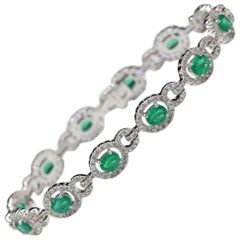 Natural Emerald Bracelet 18 Karat White Gold and Diamonds Oval Emerald